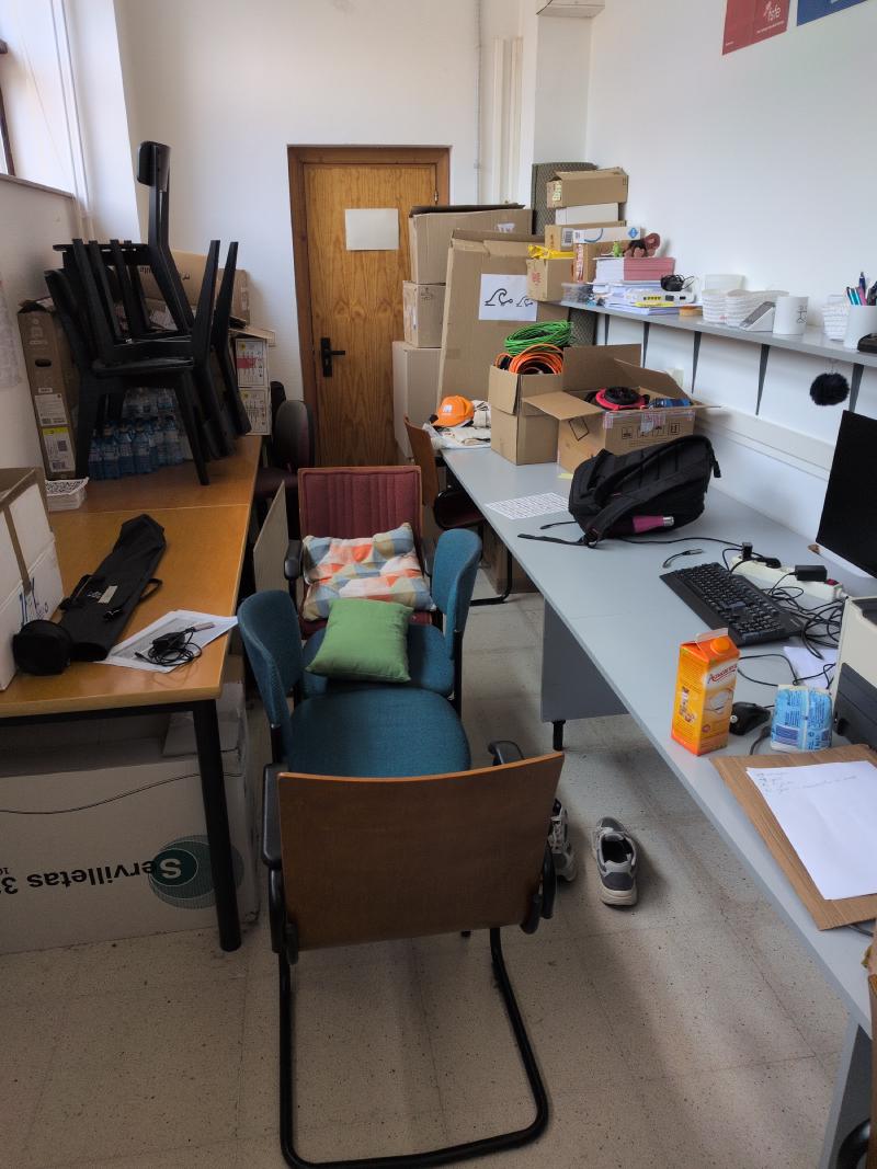 Crappy “bed” made with chairs in the GPUL office