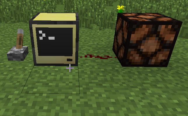 En Minecraft: Ordenador de ComputerCraft con una palanca a la izquierda y una lámpara a la derecha